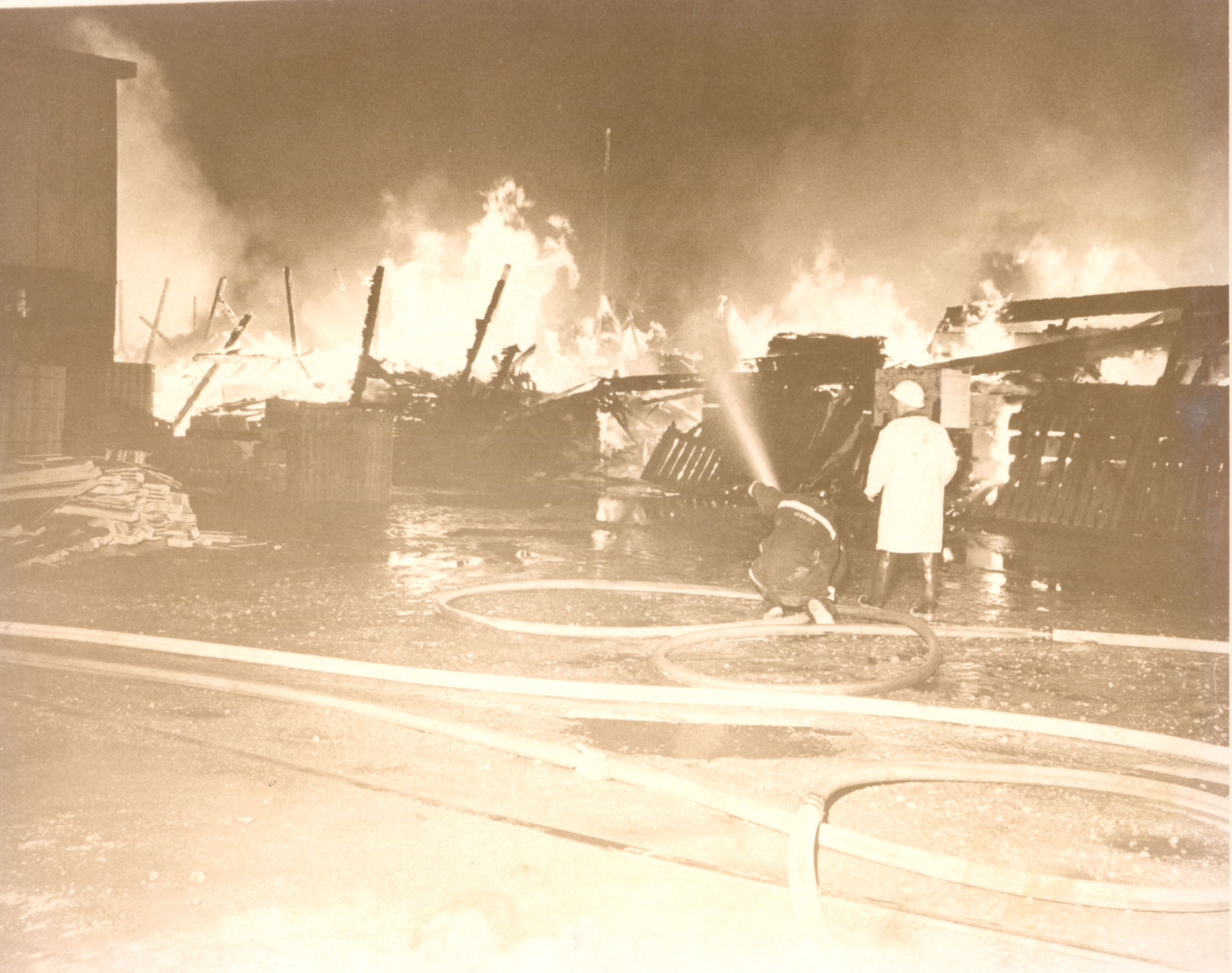 Firefighters at lumberyard fire: Waterloo riot of Sept. 13, 1968